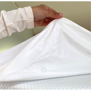 Protége-matelas imperméable 130 x 190 cm coupe gauche